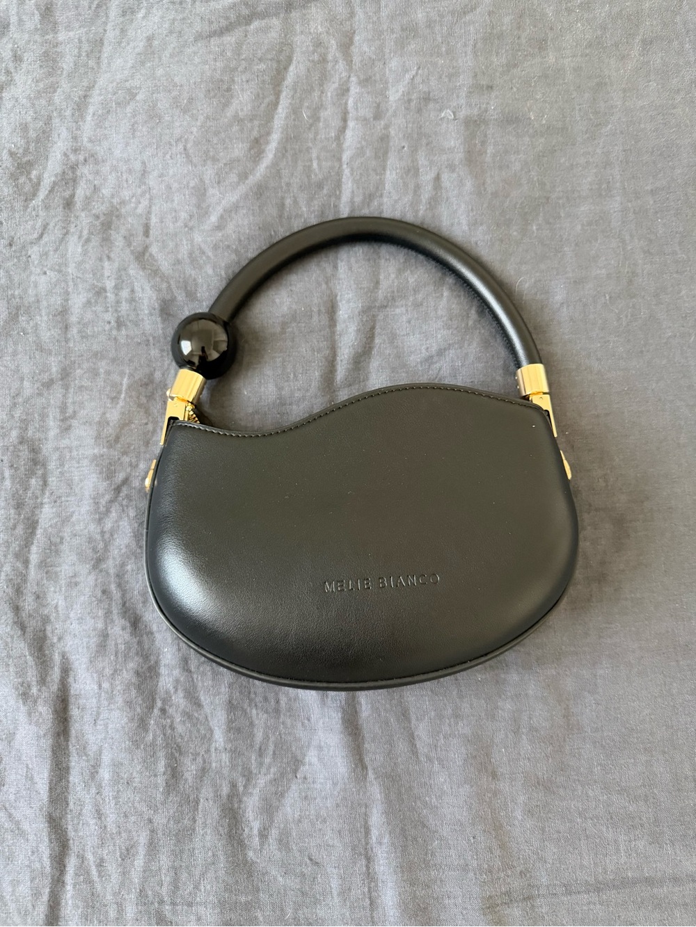 Melie Bianco Black Sculpted Mini Top-Handle Bag with Gold Hardware